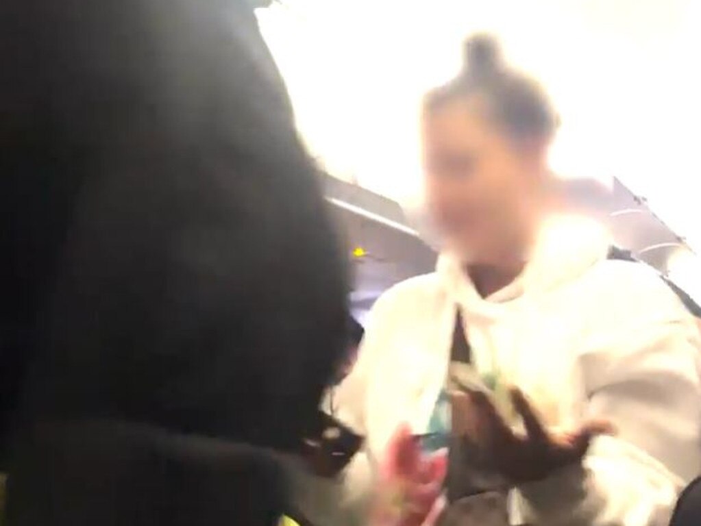 The duo were removed from the plane.
