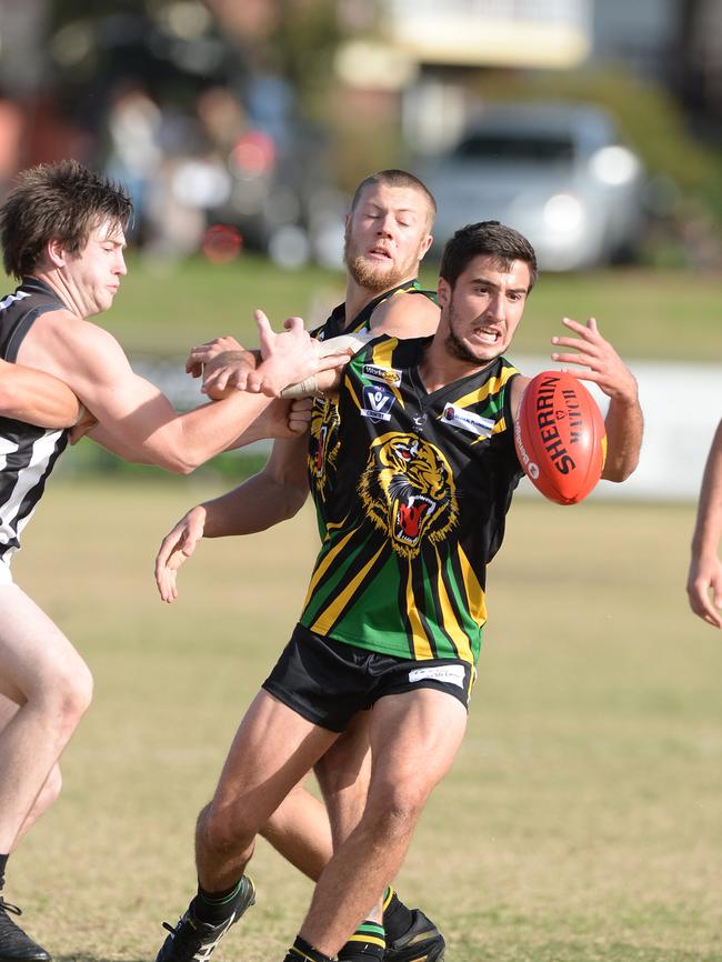 Dromana’s Callan Park battles to win the ball during the Tigers’ clash with Crib Point earlier this year: Picture: Chris Eastman.