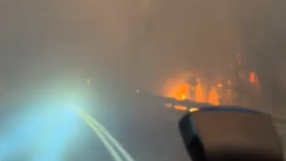 A bushfire between Granville Harbour and Zeehan in Tasmania on Thursday. Picture: Jordan Williams