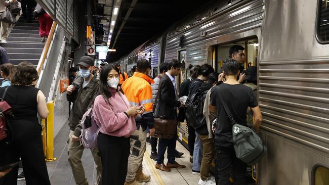 DAILY TELEGRAPH AUGUST 31, 2022. Commuters at the start of the peak hour rush at Town Hall Station in Sydney during another train strike. Picture: Jonathan Ng