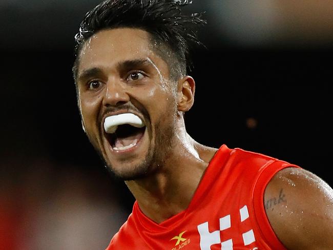 GOLD COAST, AUSTRALIA - MARCH 25: Aaron Hall of the Suns celebrates a goal during the 2017 AFL round 01 match between the Gold Coast Suns and the Brisbane Lions at Metricon Stadium on March 25, 2017 in Gold Coast, Australia. (Photo by Michael Willson/AFL Media/Getty Images)