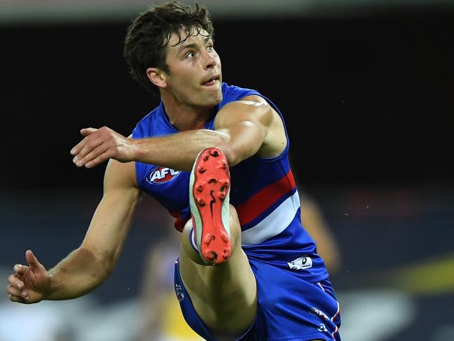 Josh Dunkley slots one for the Doggies. Picture: AFL Photos/Getty Images