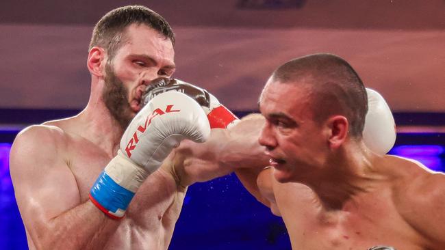 ORLANDO, FLORIDA - OCTOBER 19: Tim Tszyu punches Bakhram Murtazaliev in the nose at Caribe Royale Orlando on October 19, 2024 in Orlando, Florida. (Photo by Alex Menendez/Getty Images)