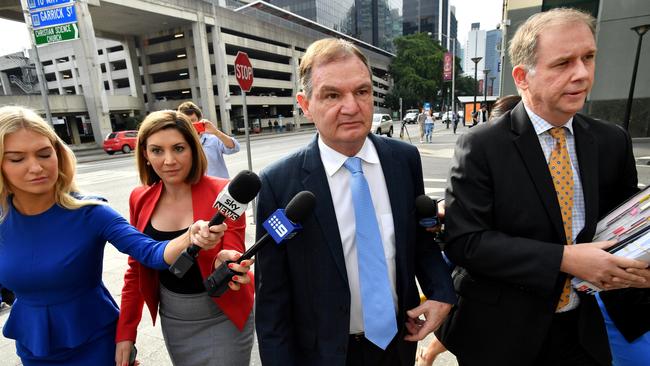 Former Ipswich mayor Paul Pisasale (centre) arriving at the Brisbane Magistrates Court in Brisbane on August 23, 2017. Picture: AAP/Darren England