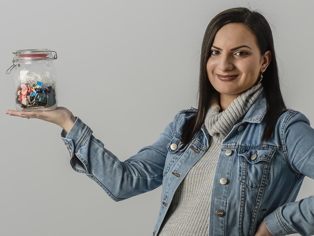 Zero Waste Big Read - Cover pic for city. (Stephanie Timotheou) holding a glass/plastic jar filled with my kitchen waste from the week.22nd June 2018. AAP Roy VanDerVegt