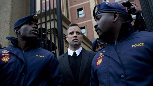 File photo of Oscar Pistorius leaving the Pretoria High Court. (Photo by KAREL PRINSLOO / AFP)