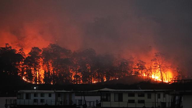 Batemans Bay under siege from fire. Picture: John Grainger