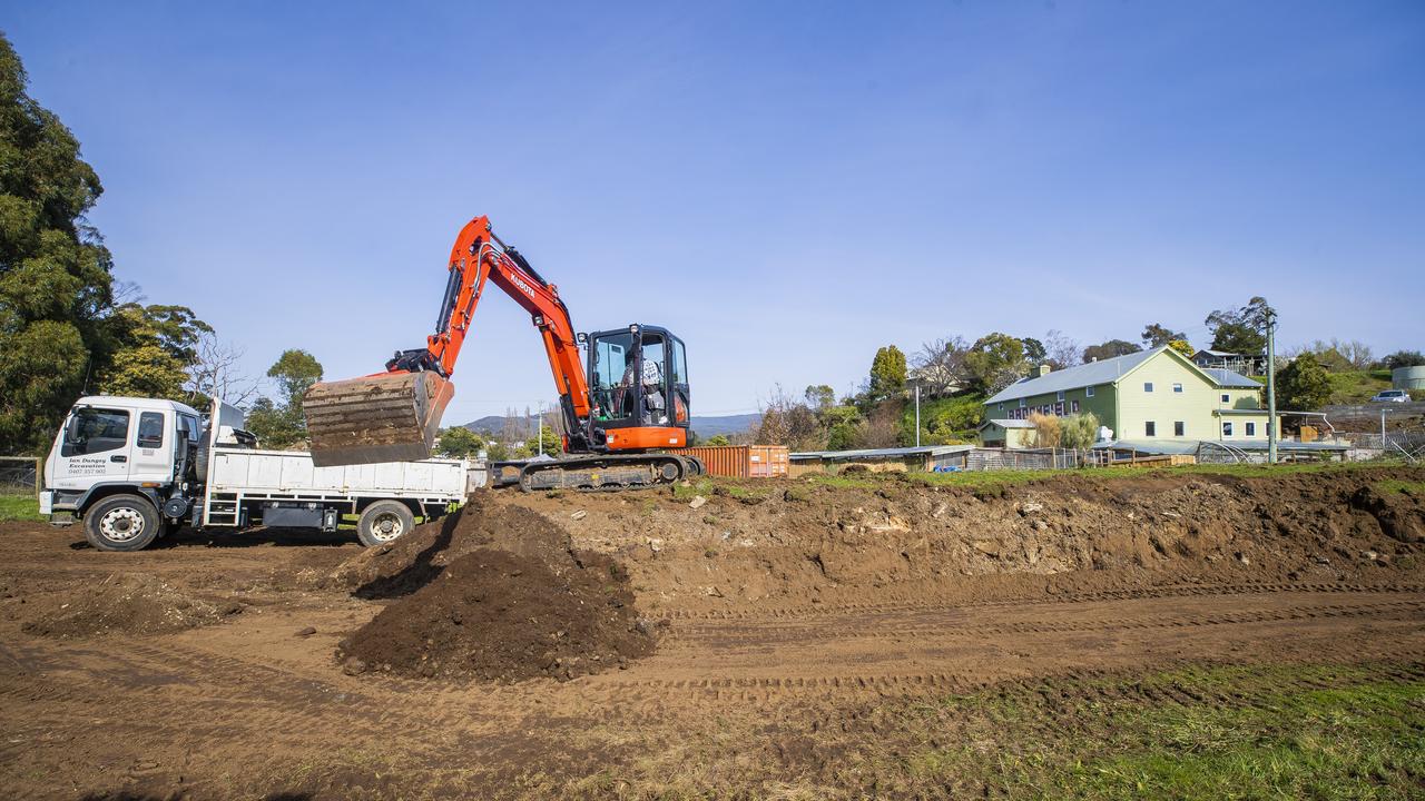 The levee being dismantled. The Brookfield property was devastated by floods in 2018 and the landlord built a levee to fix the issue, but DPIPWE has asked them to remove it within three months or risk a fine. Picture: Richard Jupe