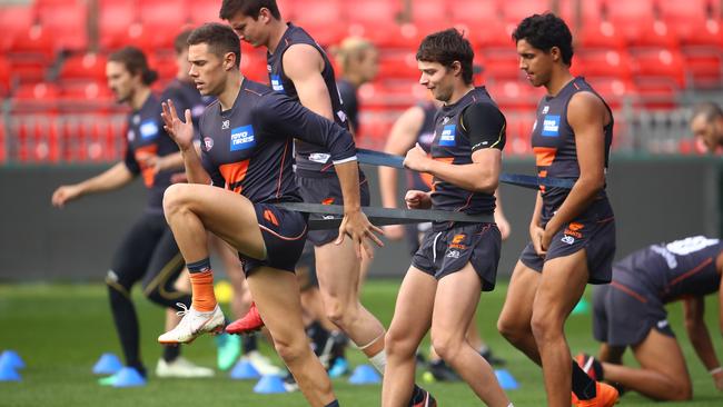 GWS midfielder Josh Kelly, left, is back as a SuperCoach force in 2018.