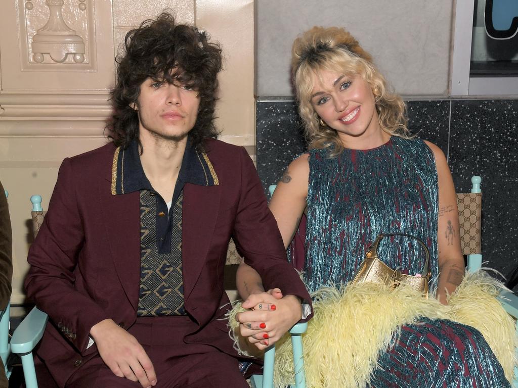 Maxx Morando and Miley Cyrus at the Guicci Love Parade on Hollywood Blvd. Picture: Michael Buckner/WWD/Penske Media via Getty Images