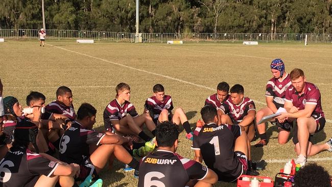 The Marsden SHS reserves listen to the halftime talk.