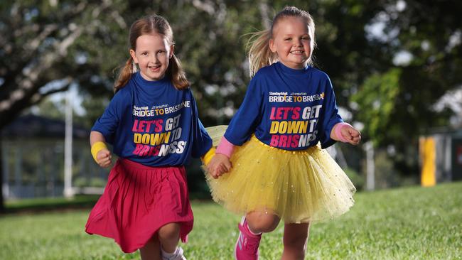 Elsie Cowan, 6, and Brooklyn Coupe, 6, in Bridge to Brisbane shirts for the launch of the 2024 Sunday Mail Transurban Bridge to Brisbane campaign. Picture: Liam Kidston