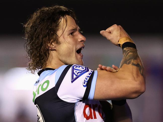 SYDNEY, AUSTRALIA - AUGUST 31: Nicho Hynes of the Sharks celebrates a try that was then disallowed during the round 26 NRL match between Cronulla Sharks and New Zealand Warriors at PointsBet Stadium, on August 31, 2024, in Sydney, Australia. (Photo by Cameron Spencer/Getty Images)