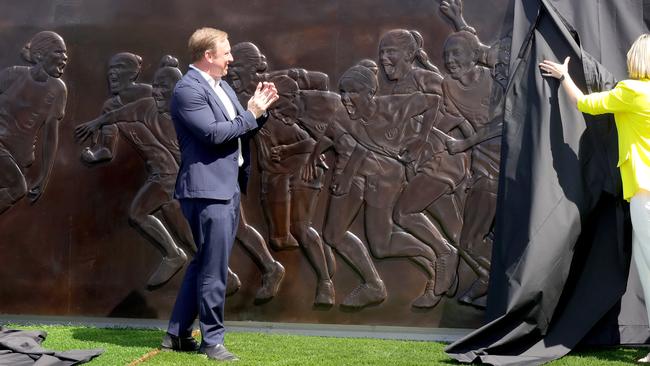 Queensland Premier Steven Miles and Minister for Women Shannon Fentiman unveil the tribute. Photo: Steve Pohlner