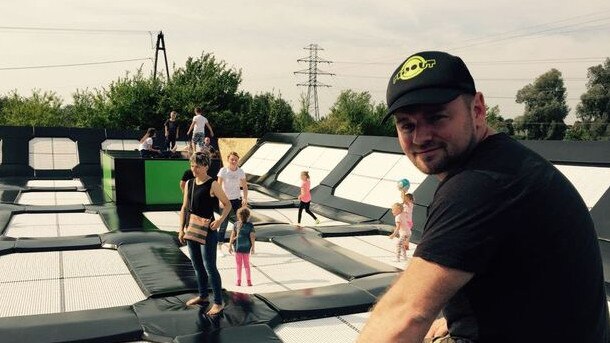 Brent Grundy at a trampoline set up near his factory in Sieradz, Poland. Picture: Supplied.