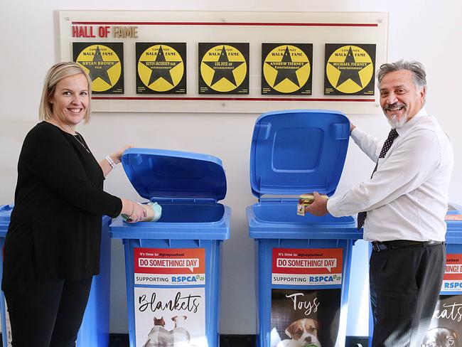 Suzanne Squires posing with Daniel Imbert at the donation bins at Revesby Workers Club in Revesby NSW, Australia. 5 July, 2018. Joyce is turning 100 and the home is having a party for her. (AAP IMAGE / Carmela Roche).