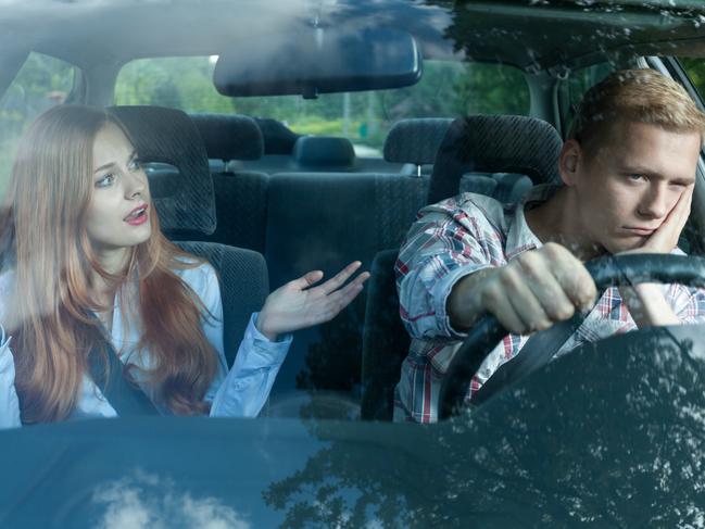 Bored man in a car listening to wife Picture: Istock