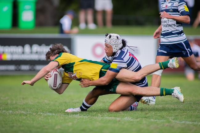 Josh Takai tackles a Wests player earlier this season. Picture courtesy of Holly Hope.