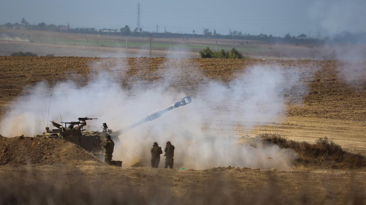 An Israeli army self-propelled howitzer fires rounds towards the Gaza Strip in southern Israel. Picture: AFP