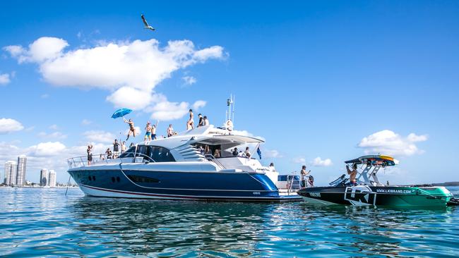 Super yacht wake boarding happens on the Gold Coast.