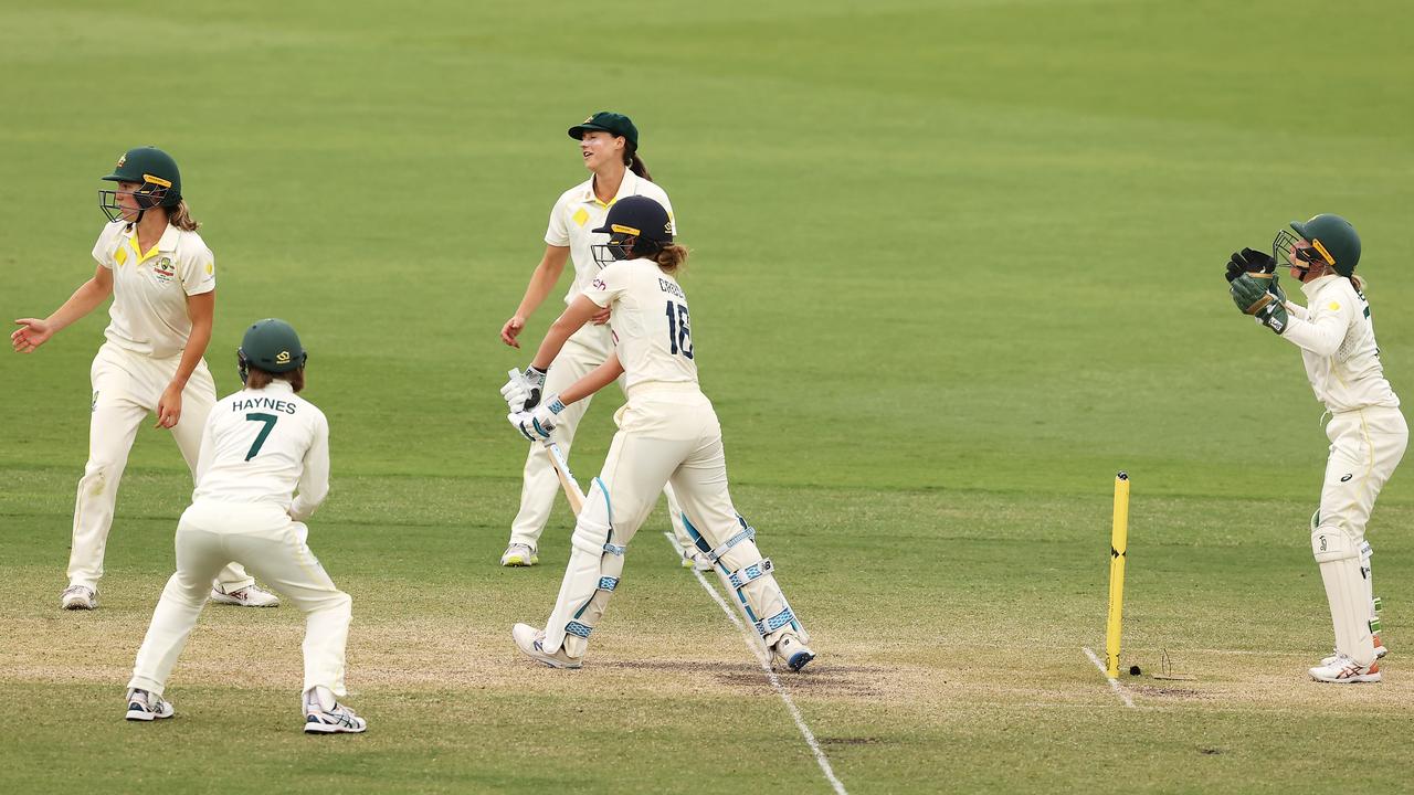 Kate Cross of England blocks out the final ball. Photo by Mark Kolbe/Getty Images