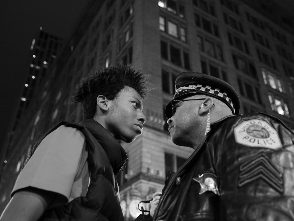“March Against Police Violence” by photographer John J. Kim for the Chicago Tribune which won a third prize in the Contemporary Issues singles category shows Lamon Reccord staring down a police sergeant during a protest following the fatal shooting of Laquan McDonald by police in Chicago, Illinois, USA, Nov. 25, 2015.(John J. Kim/Chicago Tribune, World Press Photo via AP)