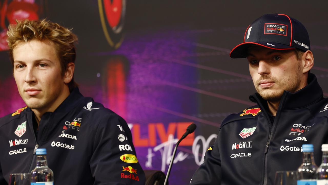 Verstappen (right) with his new Red Bull teammate Liam Lawson.. (Photo by Zak Mauger/Getty Images)