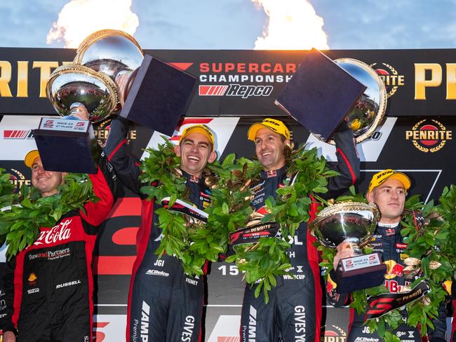 MELBOURNE, AUSTRALIA - SEPTEMBER 17: Jamie Whincup driver of the #88 Red Bull Ampol Racing Chevrolet Camaro ZL1 and Broc Feeney driver of the #88 Red Bull Ampol Racing Chevrolet Camaro ZL1 celebrate after winning the Penrite Oil Sandown 500, part of the 2023 Supercars Championship Series at Sandown Raceway on September 17, 2023 in Melbourne, Australia. (Photo by Daniel Kalisz/Getty Images) *** BESTPIX ***