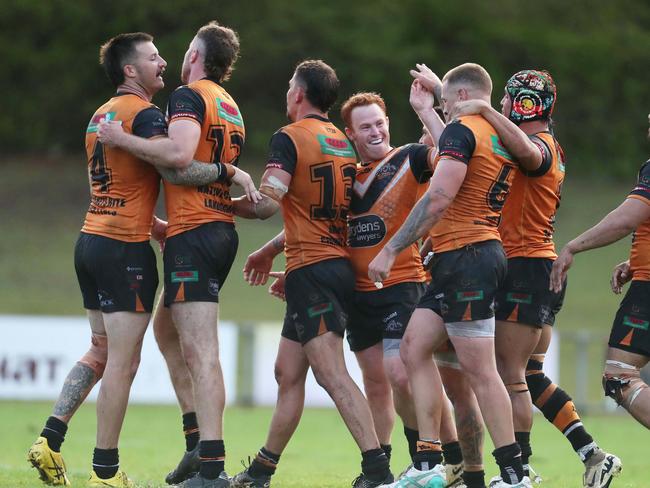 Tigers celebrate win in Denton Engineering Cup round two. Wyong Roos vs The Entrance Tigers at Morry Breen Oval, 20 April 2024 pic Sue Graham