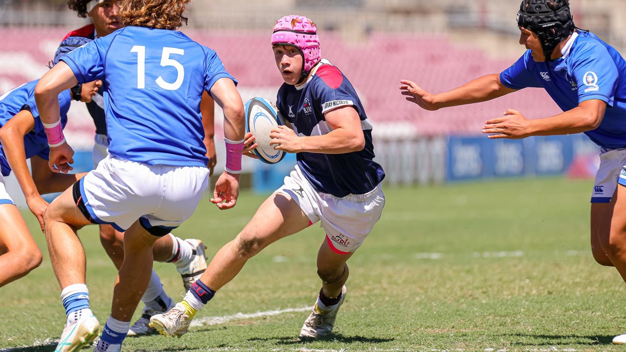 Buildcorp Emerging Reds Cup action from the day one match between Queensland Country Under-14s and Brisbane Junior Rugby Union Under-14s. Picture credit: QRU Media/ Erick Lucero.