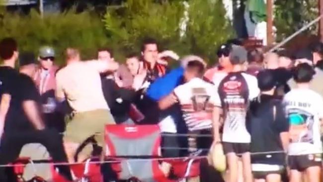 A fight breaks out involving players and spectators during the Eagles-Panthers first-grade elimination final at Erina Oval yesterday. Picture: NBN TV