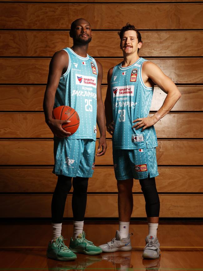 Tasmania JackJumpers players Milton Doyle and Lachie Barker wearing teal jerseys in preparation for the 2024 teal game on Saturday February 17 in honour of Jo Harris and charity partner SHE. Picture: Nikki Davis-Jones