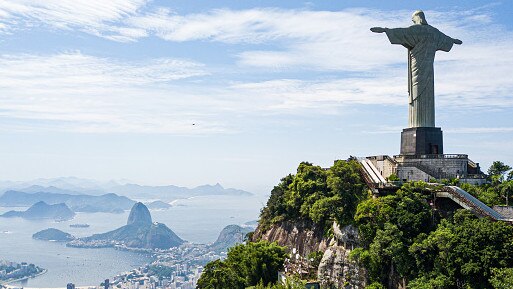 Christ the Redeemer overlooks Rio de Janeiro’s astonishingly beautiful bay. (Photo: Buda Mendes/Getty Images)