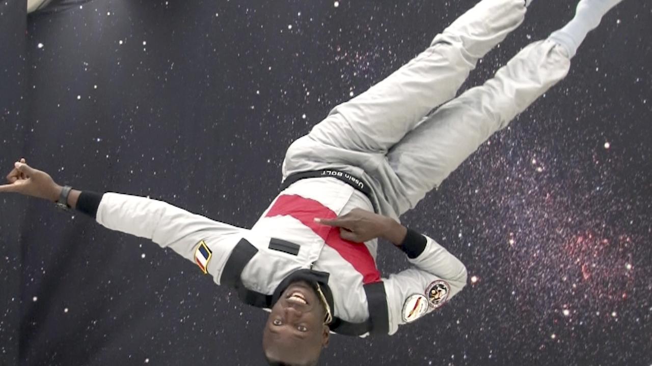 Usain Bolt enjoys a zero-gravity flight over France.