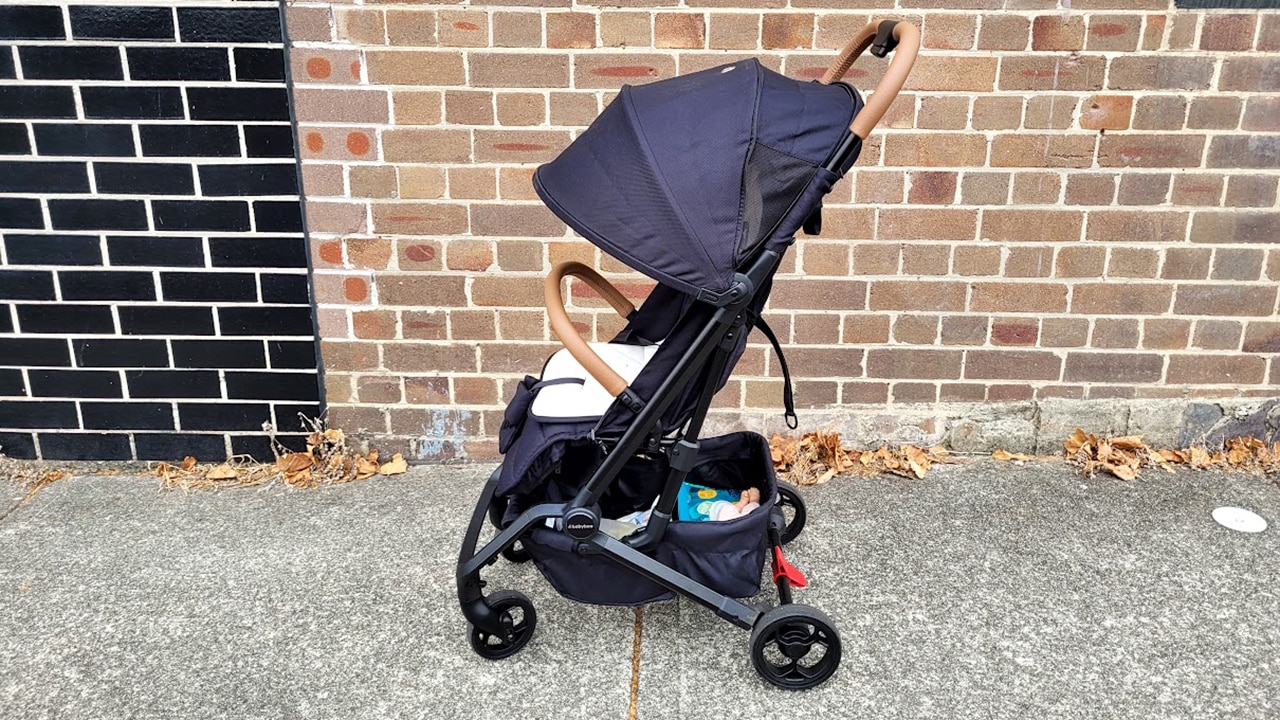 From the moment I unfurled this compact travel stroller I was in love. Picture: Escape/Stephanie Yip