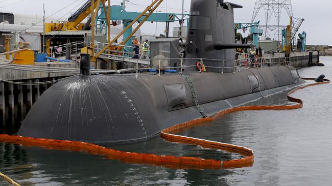 Work continues on a Collins class submarine at ASC docks in Osborne in February. Pic: Kelly Barnes/The Australian.