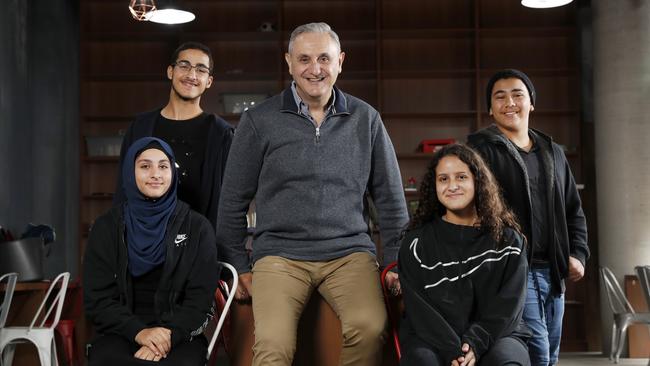 Alpha Omega’s Chris Papadopoulo with students from left Amani Allam, Amir Issa, Yassmin Lyamani, and Mohammed Elmourad. Picture: Jonathan Ng