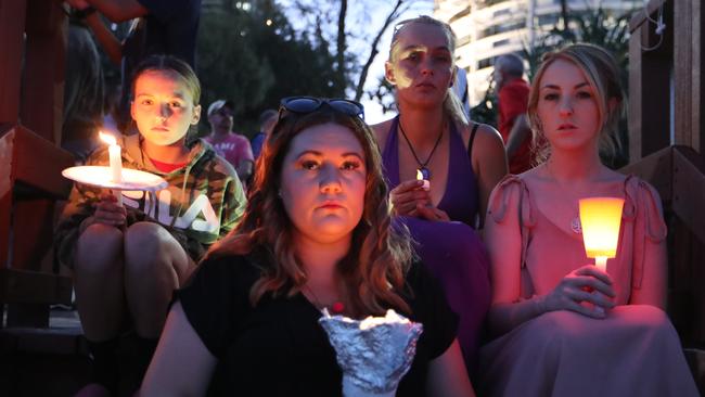 A candle light vigil was held for the baby found dead on Surfers Paradise Beach but law reform is needed to prevent further tragedies. Picture: Glenn Hampson