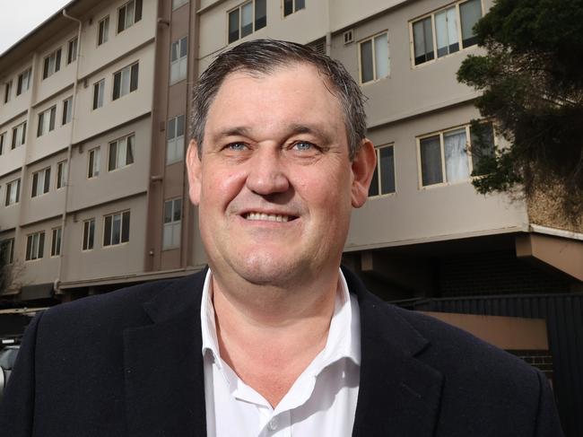 Alinta Energy CEO Jeff Dimery - for future energy story. Jeff outside the housing commission blocks he grew up in Port Melbourne.                   Picture: David Caird