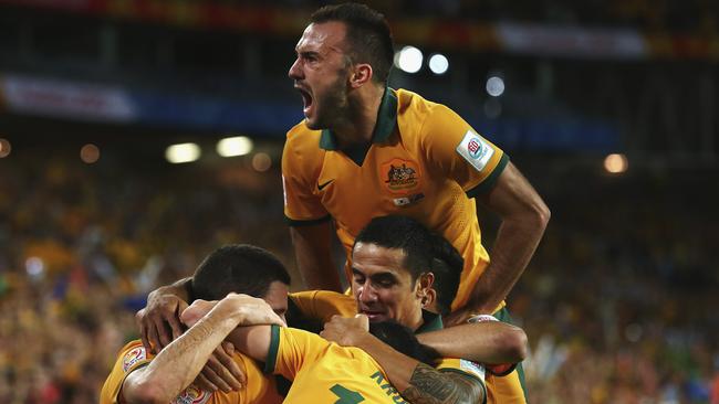 SYDNEY, AUSTRALIA - JANUARY 31: Ivan Franjic of Australia celebrates after Massimo Luongo of Australia scored his teams first goal during the 2015 Asian Cup final match between Korea Republic and the Australian Socceroos at ANZ Stadium on January 31, 2015 in Sydney, Australia. (Photo by Ryan Pierse/Getty Images)