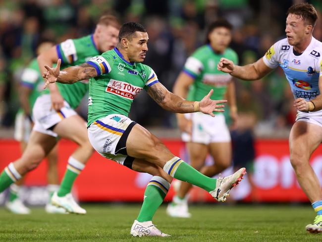 CANBERRA, AUSTRALIA - APRIL 14: Jamal Fogarty of the Raiders kicks a field goal to win during the round six NRL match between Canberra Raiders and Gold Coast Titans at GIO Stadium, on April 14, 2024, in Canberra, Australia. (Photo by Mark Nolan/Getty Images)