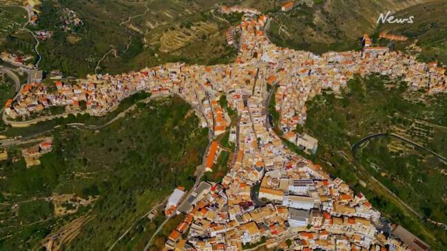 Stunning drone footage of village shaped like a person