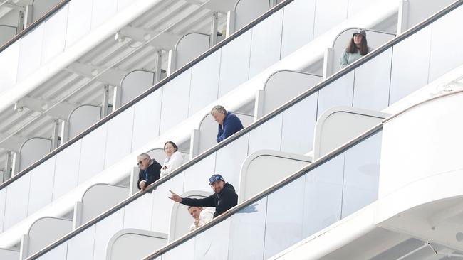 Passengers out on the decks as the ship arrives into Hobart. P&O Cruises ship Pacific Adventure docks in Hobart after being denied access to dock in New Zealand. Picture: Nikki Davis-Jones