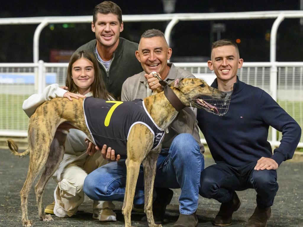 Alpha Zulu with trainer Jason Thompson and family and AFL great Jonathan Brown