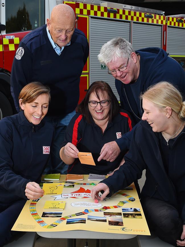 CFA members Fiona Macken, Hugh Pilsworth, Antoinette Ribchester, Bill Pritchard and Kellie Clarkson roll the dice.