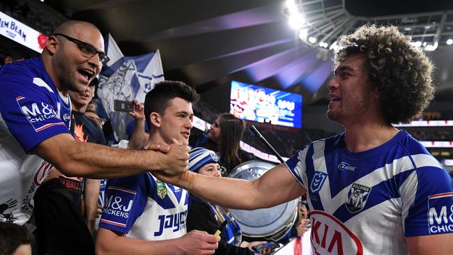 Even the fans are smiling again. Photo: AAP Image/Dan Himbrechts