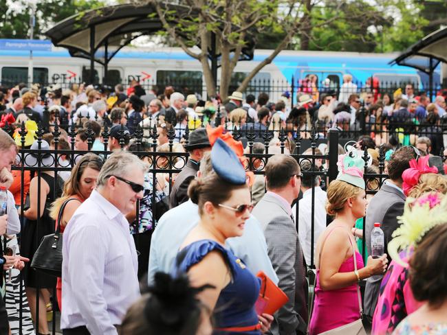 Transport chaos as racegoers attempt to board trains for the city after Melbourne Cup Day 2014 at Flemington Racecourse. Picture: Nathan Dyer