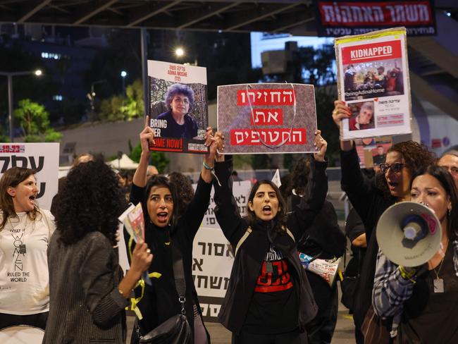 Families of Israeli hostages held by Palestinian militants in the Gaza Strip protest outside the ministry of defence in Tel Aviv. Picture: AFP