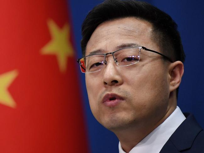 Chinese Foreign Ministry spokesman Zhao Lijian speaks at the daily media briefing in Beijing on April 8, 2020. (Photo by GREG BAKER / AFP)