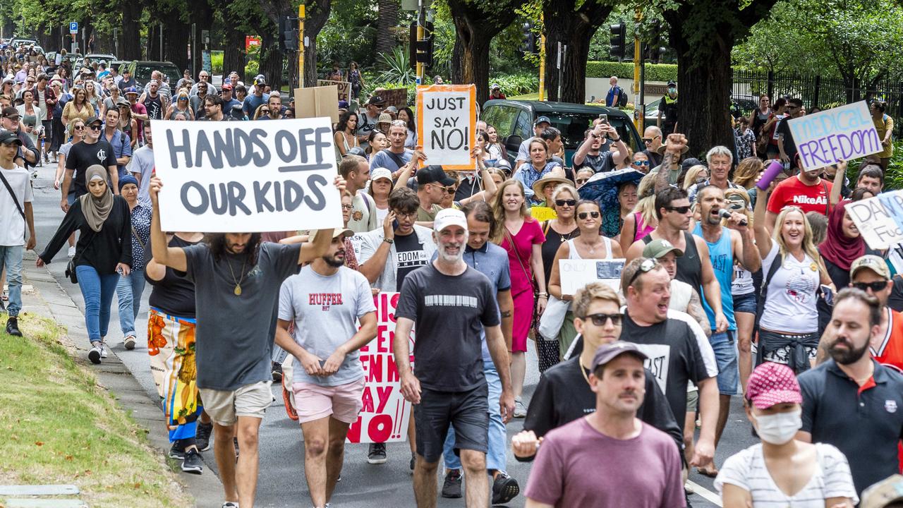 Protesters march along St. Kilda Road. Picture: Jake Nowakowski